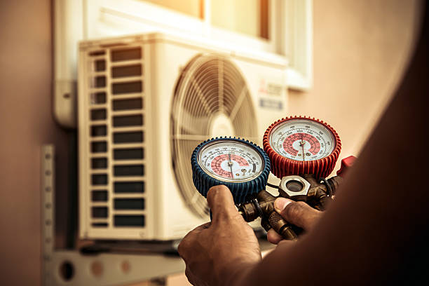 Professional Air Conditioning Service technician working in Millsboro, PA